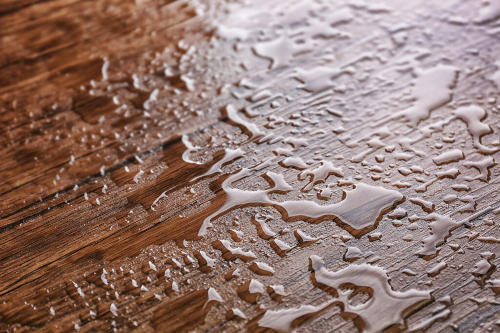 Water drops on wooden background
